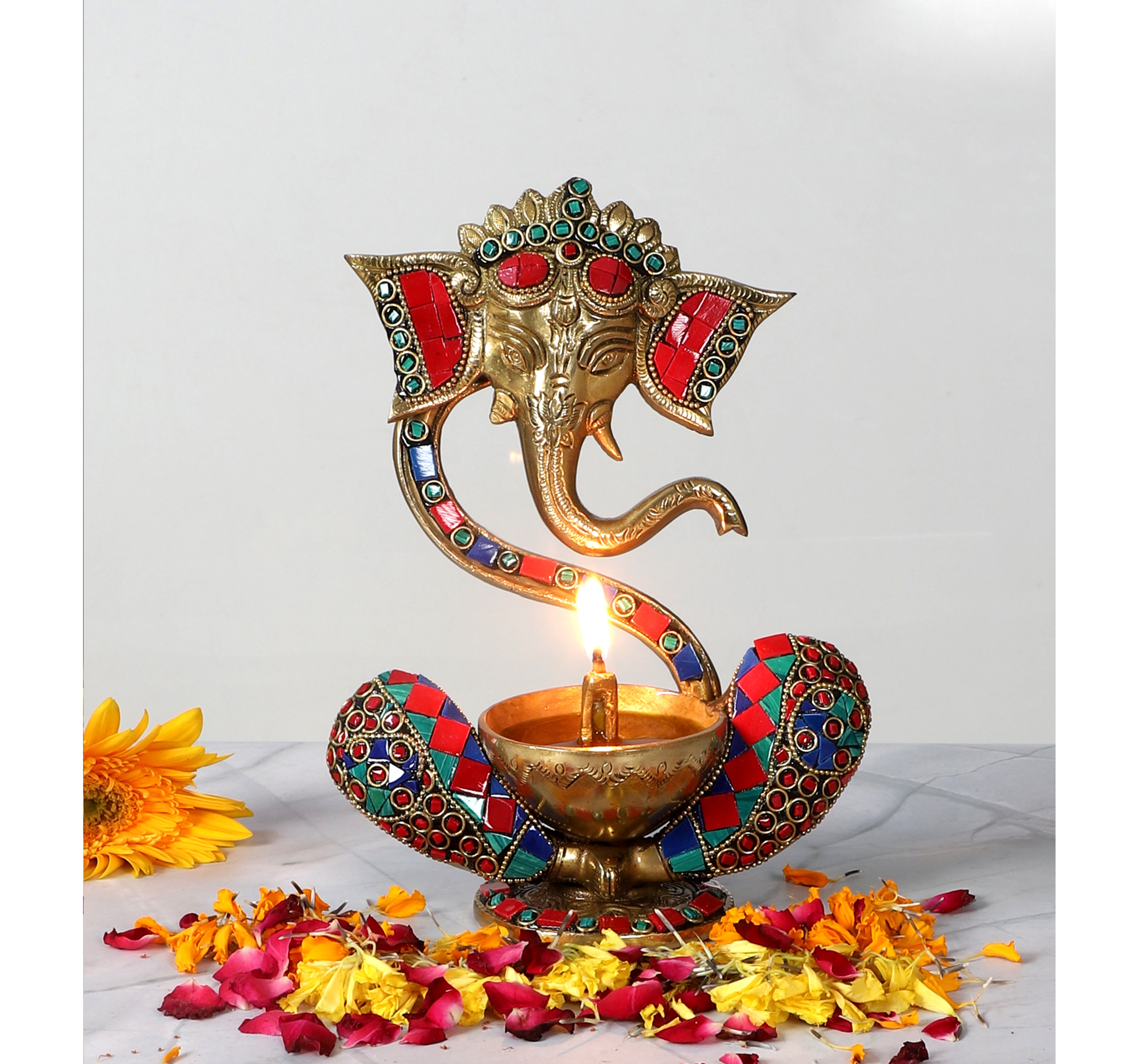 Gemstone Work Brass 8 Inches Blessing Ganesha With Diya on Lap